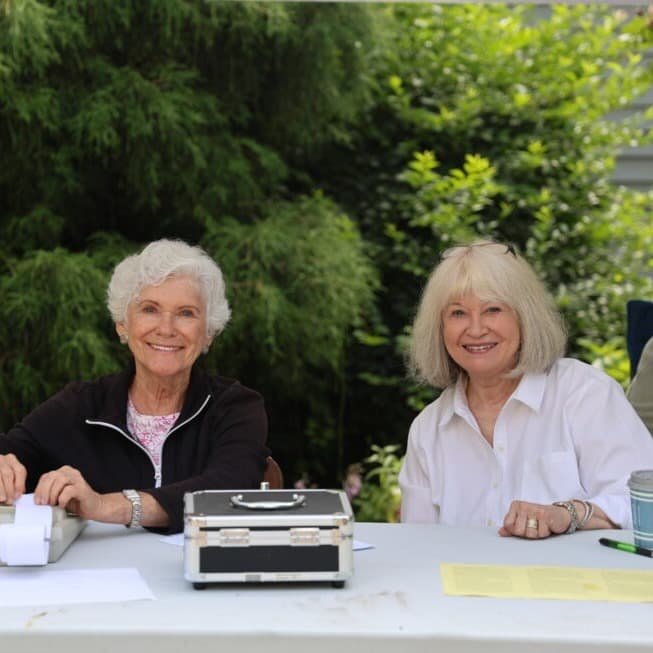 Garden Club members hosting the scholarship plant sale at the Old School House